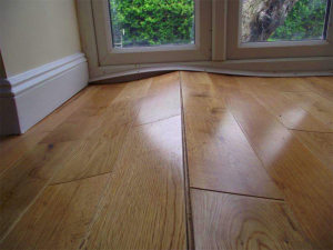 A Quick and Easy Way to Repair Buckled Hardwood Flooring