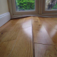 A Quick and Easy Way to Repair Buckled Hardwood Flooring