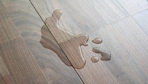How to fix swollen wood flooring after water damage?